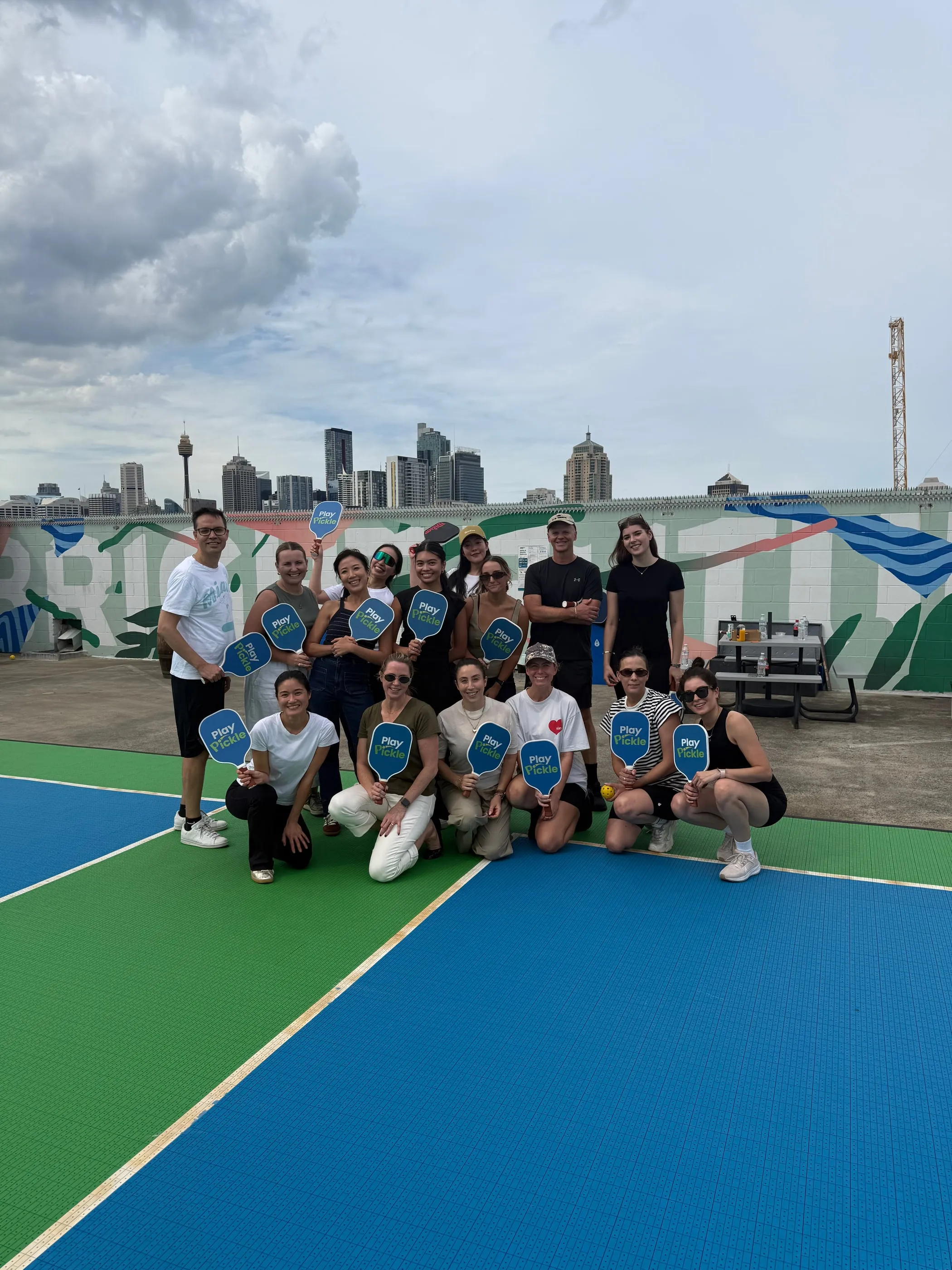 A group of players together on the rooftop after a session